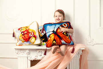 Baby, pillow, fireplace