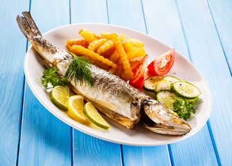 Fish dish - fried fish fillet with vegetables 