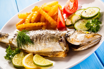 Fish dish - fried fish fillet with vegetables 
