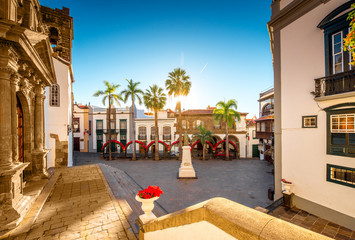 Central square in old town with Salvador church and monument in Santa Cruz de la Palma in Spain