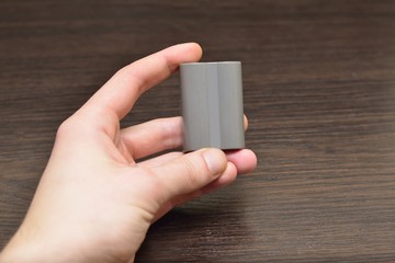 hand shows how to recharge battery