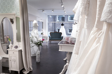 Fototapeta na wymiar interior bridal shop, wedding store, shop window, view from changing area