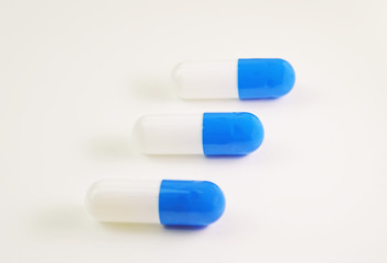 White and blue capsules
