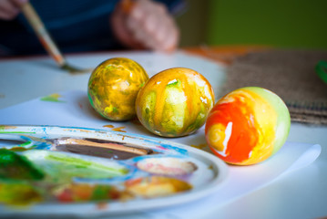 The abstract colored painted eggs