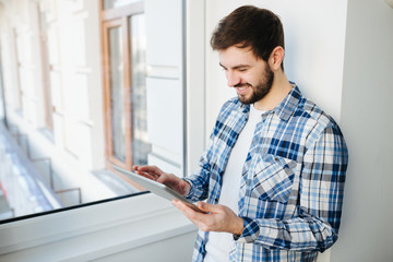 hipster man using tablet