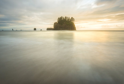 Fototapeta scenic view of sea stack in Second beach when sunset,in mt Olympic National park,Washington,usa.