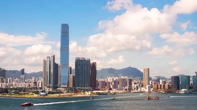 View toward Kowloon office buildings and architecture from Hong Kong harbour 4K