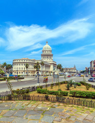 Fototapeta na wymiar The Capitol building and heavy traffic of city center, Havana