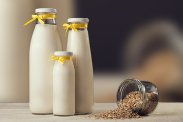 Corn flakes cereal and milk for have breakfast on wooden backgro