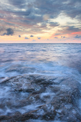 Obraz premium Long exposure sea and rocks at twilight