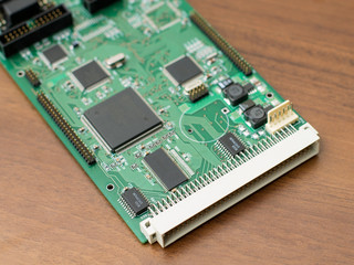 Green circuit board with a large plug