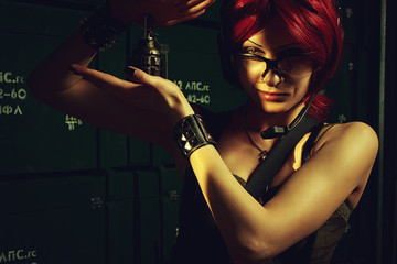 Redhead girl with grenade