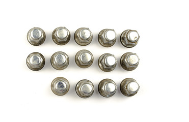 car wheel bolts isolated on white. auto parts.the wheel nuts, cap, bolt on a white background. bolt and nut isolated on white background. Close-up of various steel nuts and bolts