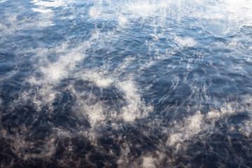 Water vapor on surface of cold water