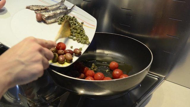 Pomodori e acciughe