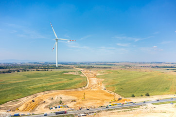 Windmill and road under construction