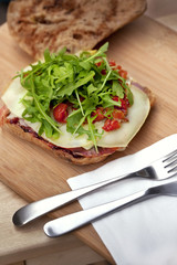 Toast of cheese and green salad