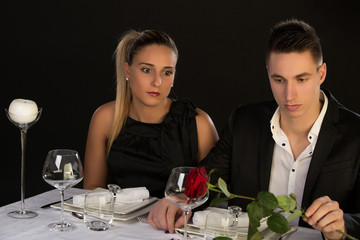 Couple having relationship problems , no more talking, in fine restaurant