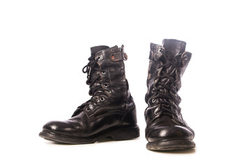 old black combat boots on white background