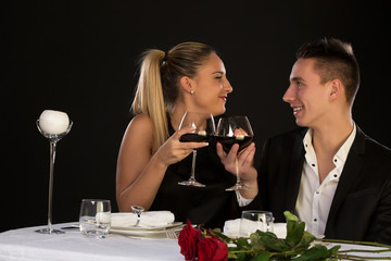 Beautiful couple having romantic dinner at restaurant