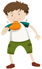 Little boy eating chicken