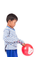 Fototapeta na wymiar happy cute little boy play with red balloon