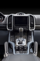 Luxury car dashboard. Interior detail. Vertical photo.