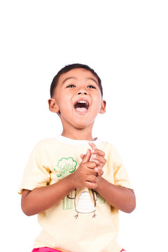 portait happy little boy amile laughing