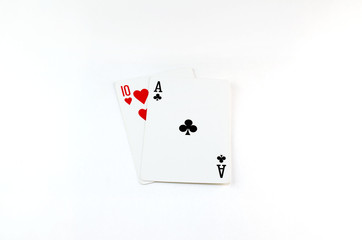 two playing cards ace and a ten