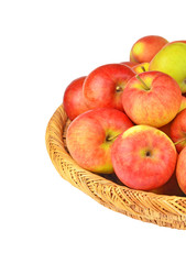 Red apple in a wattled basket