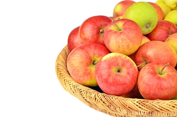 Red apple in a wattled basket