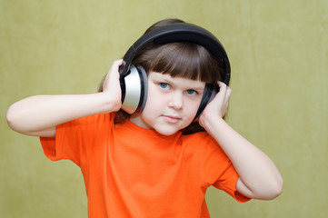 Beautiful girl with headphones listening to music