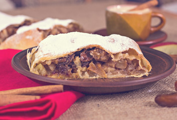 Apple strudel or apple pie  with dates and cinnamon