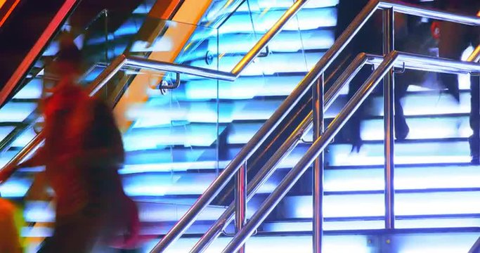 Abstract modern city lifestyle background of blurred people walk fast at night