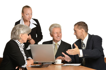 Businesspeople at work with laptop