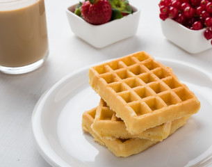 three waffles on plate