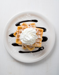 three waffles on plate