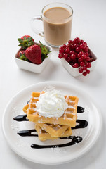 three waffles on plate