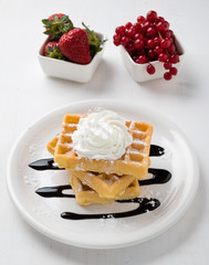 three waffles on plate
