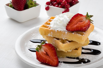 waffle with fruits on white plate