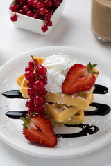 waffle with fruits on white plate