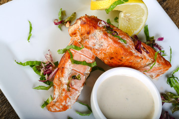 Baked salmon with sauce