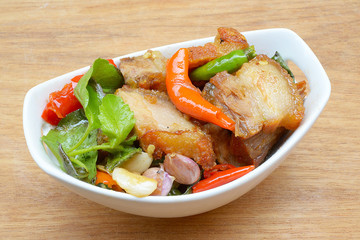Thai food fried basil with crispy pork
