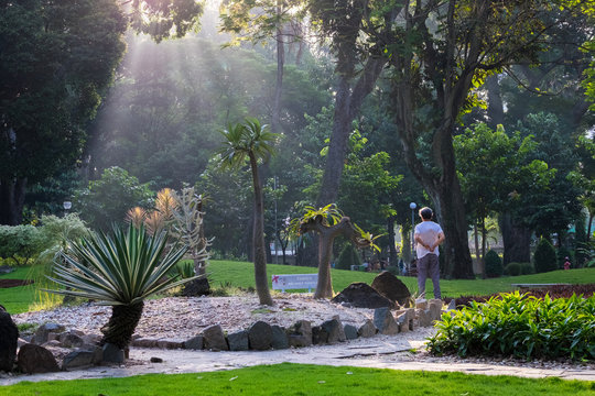 Old man do exercise morning in park. HO CHI MINH, VIETNAM