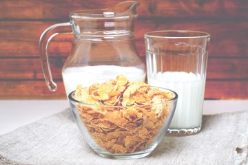 corn flakes with milk.Toned image