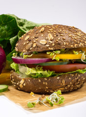 Vegetarian sandwich with fresh vegetables.