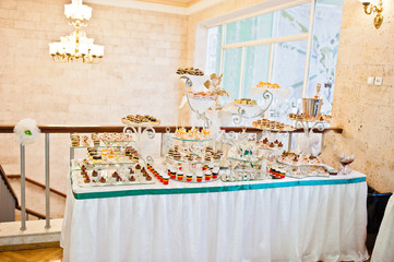 Wedding reception, table of cakes and drink