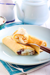 Crepes filled with cream cheese