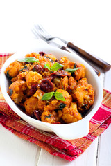 Spicy  cauliflower, tomato and basil