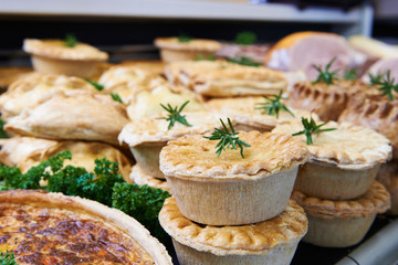 Close Up Of Baked Savoury Goods In Delicatessen